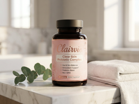 Clairvie bottle on marble bathroom counter
